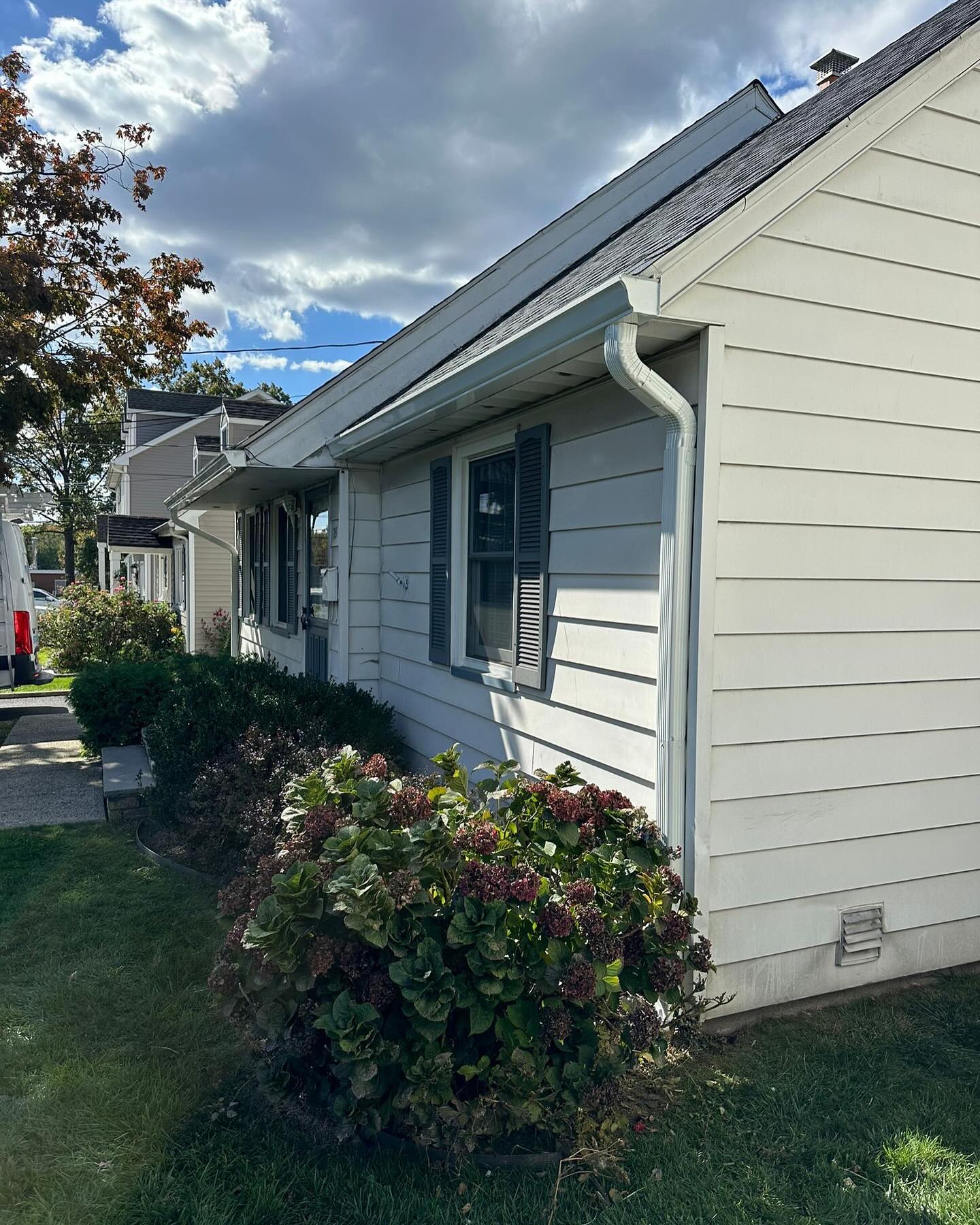 White Siding & Gutters